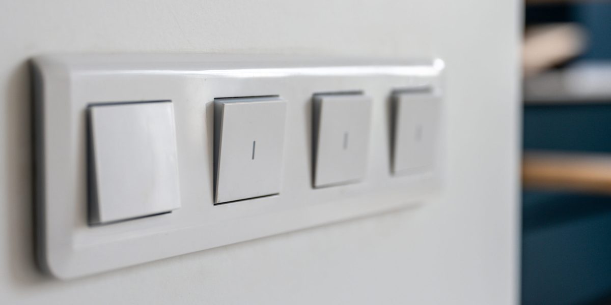 four-light-switches-macro-with-bokeh-background-minimal-design-scaled.jpg - ReactiveNews