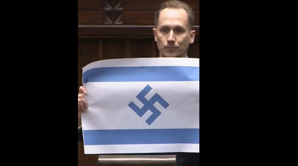 Deputat de extremă dreapta, ȘOC în Parlamentul polonez: steag israelian cu svastică