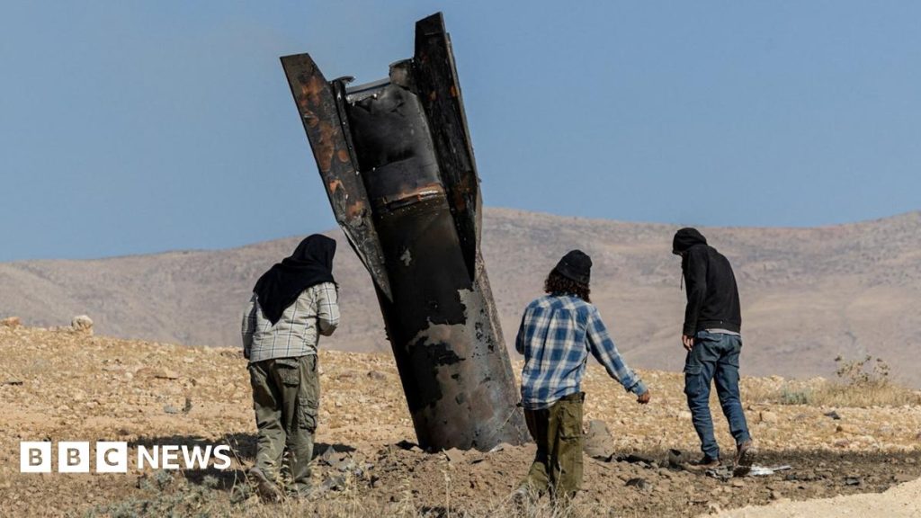 Israel hits Iran with air strikes after Tehran fires missiles at northern Israel - live updates
